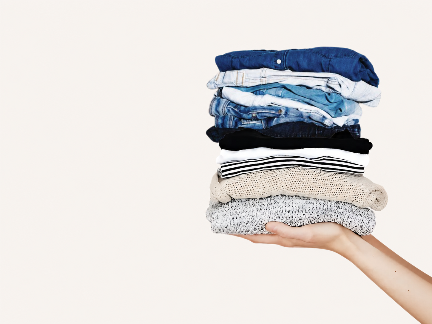 Folded knit, denim, and woven garments held out for inspection — Jiangsu Ventures Ltd. sourced fabrics