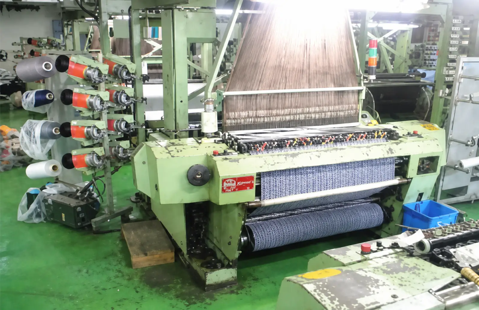 Jiangsu Ventures Ltd. partner factory floor — spinning, weaving, and knitting production, image 11